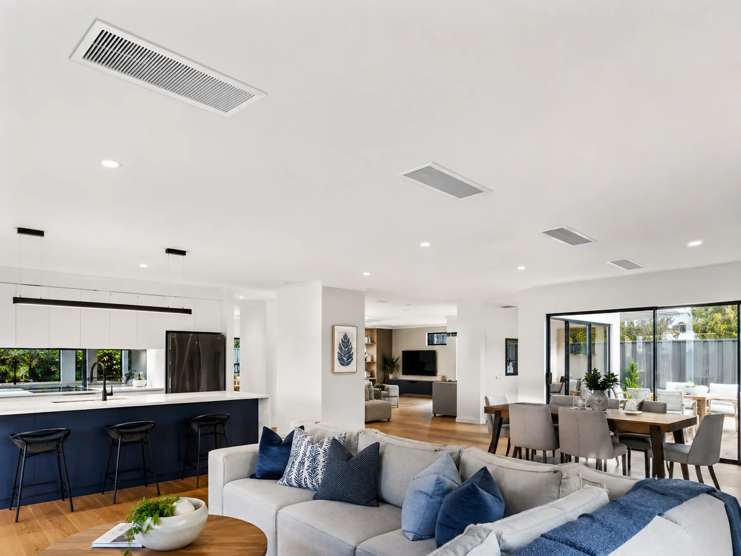 Ducted air conditioning vents in a modern home interior